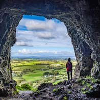 A woman in the Caves of Keash in County Sligo