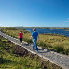 Image of people on Derrigimlagh Loop Walk, Connemara, County Galway